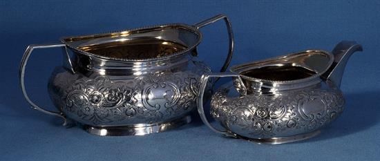 A George III silver sugar bowl and cream jug, by James Turner, bowl height 80mm, weight 17.8oz/556grms.